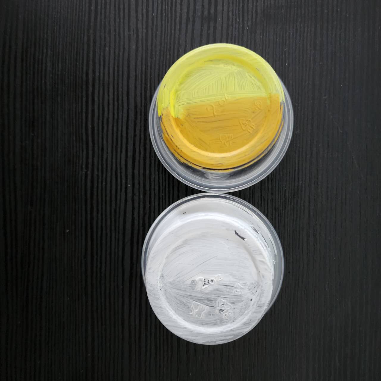 Experimenting with different colors and paint thicknesses to find the right tone. We painted this on a similar material as the ornament to ensure consistency.