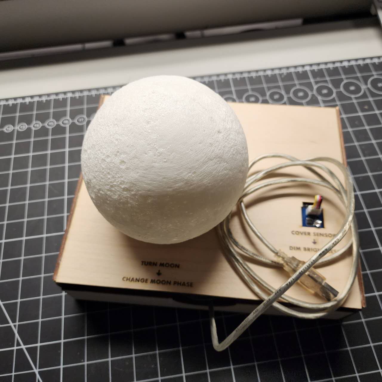 Hardware (Circuit + Arduino) Prototype. Showing the interactions included in the Physical model including the rotary potentiometer and the light sensor.